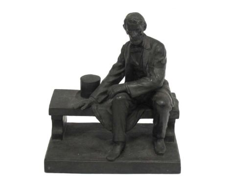 XIX Century Spelter Figure of Abraham Lincoln Seated on a Bench, 17cm high.