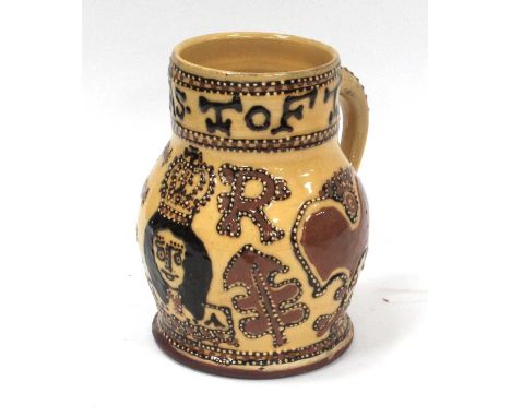 A Thomas Toft Slipware Single Handle Mug, 'CR' with bust, approximately 15cm high.No chips, wear commensurate with age, see i