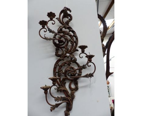 A LARGE ROCOCO STYLE SIX LIGHT WALL APPLIQUE. SCROLLING FOLIATE FORM. 98CM HIGH 
