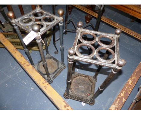 TWO SIMILAR VICTORIAN IRON STICK STANDS