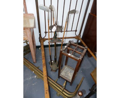 AN UNUSUAL VINTAGE GOLF RELATED SMOKING STAND. A STICK STAND AND A BRASS FIRE FENDER