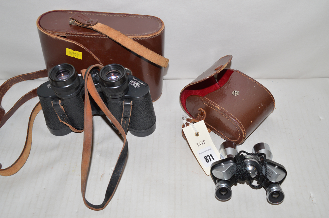 A pair of Carl Zeiss 8 x 30 binoculars in brown leather case; and a