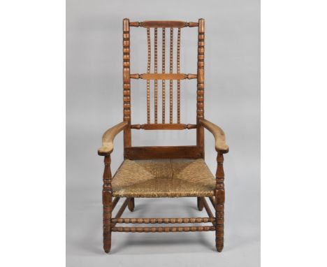 A 19th Century Armchair with Bobbin Back, Cane Seat 