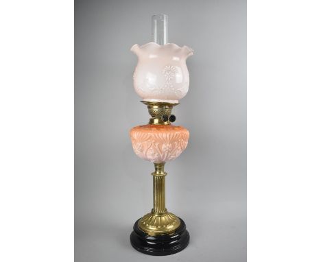 A Late 19th Century Brass and Opaque Glass Oil Lamp, Complete with Shade and Chimney, Reservoir with Moulded Thistle Design, 
