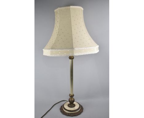 A Brass and Alabaster Base Table Lamp, Support of Reeded Column Form, Complete with Shade 