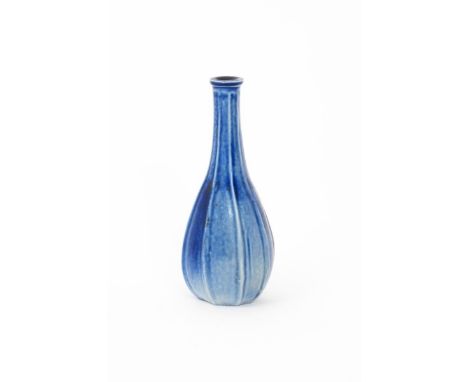 A Martin Brothers stoneware gourd vase by Edwin & Walter, ovoid with tall tapering neck, ribbed form, covered in a blue glaze