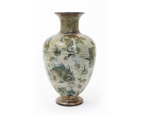 A large Martin Brothers stoneware Aquatic vase by Robert Wallace Martin, dated 1890, baluster form, incised with shoals of gr