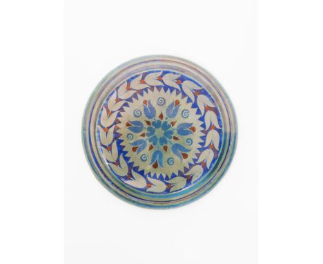 A William De Morgan Sunset and Moonlight Suite roundel by Fred Passenger, dated 1902, circular, painted with a central flower