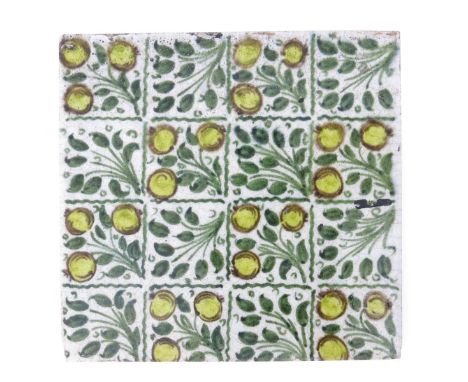 A William De Morgan Chelsea Period Berries and Leaves tile, painted in shades green and yellow on a white ground impressed ma