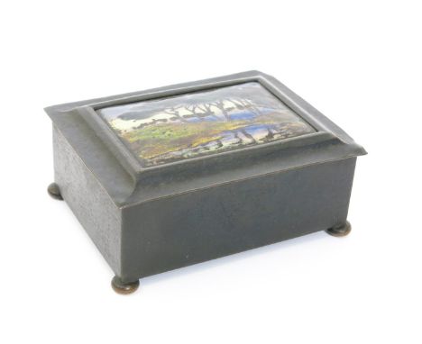 A Guild of Handicrafts patinated copper and enamel box,  the rectangular casket with hammered finish, on ball feet, hinged co
