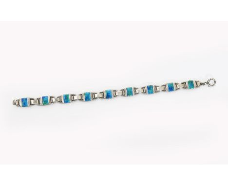 A Murrle Bennett silver and enamel link bracelet, each shaped rectangular panel enamelled green and blue unsigned 18.5cm. lon