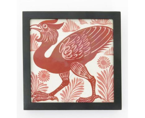 A William De Morgan Fantastic Bird tile,  glazed in red lustre on a cream ground, later framed marks concealed 14.5cm. square