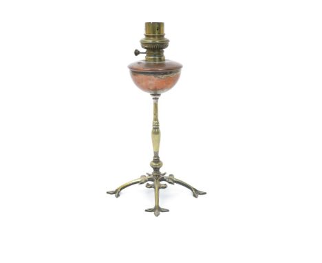 A W.A.S Benson copper and brass oil lamp,  cruciform foliate foot with knopped cylindrical stem and flaring copper oil reserv