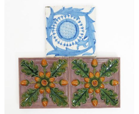 A Dutch Sunflower tin glaze tile designed by William Morris or William De Morgan, painted in shades of blue on an off white g