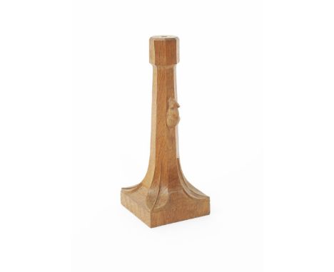 A Robert Mouseman Thompson oak table lamp, the tapering stem with carved foliate motif, carved mouse signature 25.5cm. high