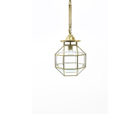 A Secessionist style brass ceiling light, in the manner of Adolf Loos, with faceted glass panels, on solid brass chain, 30cm.