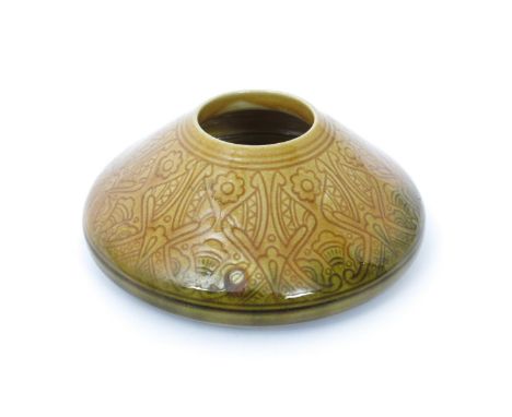 A small Linthorpe Pottery vase designed by Dr Christopher Dresser, compressed form, incised with floral motif glazed ochre to