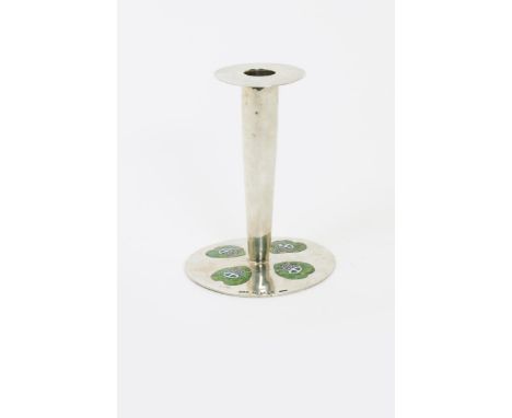 A Liberty & Co Cymric silver and enamel candlestick designed by Archibald Knox, model no.25, the circular base cast in low re