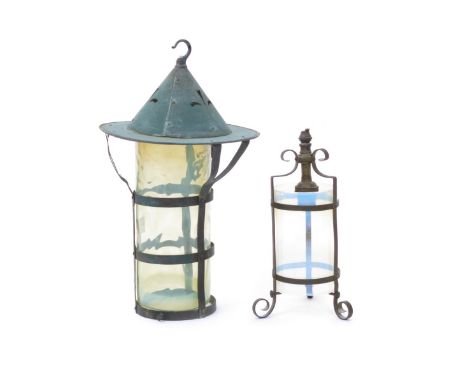 A small patinated metal and glass lantern,  the cylindrical glass shape probably Powell, and another hall lantern unsigned 24