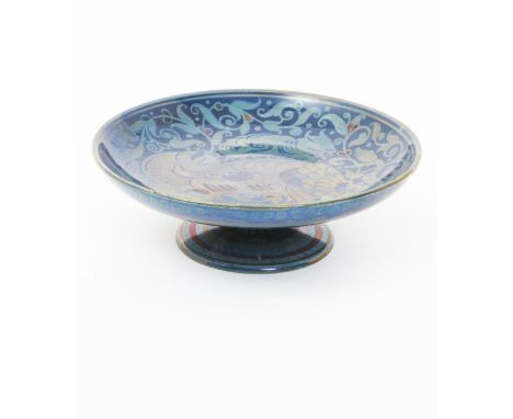 A William De Morgan Sunset and Moonlight suite tazza by Fred Passenger, painted to the well with a grotesque creature, with y