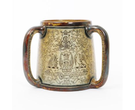 A Martin Brothers stoneware tyg by Robert Wallace Martin, incised with coat of arms amidst scrolling foliage in shades of bro