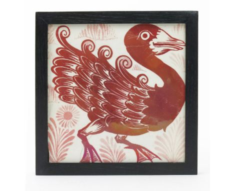 A William De Morgan Duck and Foliage tile,  painted in shades of ruby lustre, later framed 14.5cm. wide Literature Martin Gre
