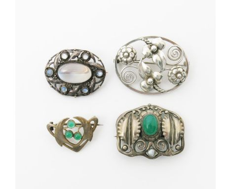 A Theodore Fahrner silver brooch, stamped in relief with flowers and foliage, set with chrysoprase stone and mother of pearl 