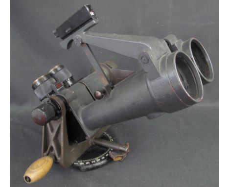 PAIR OF GERMAN SECOND WORLD WAR ANTI-AIRCRAFT BINOCULARS having wooden adjustment handles, revolving base with scale and rubb