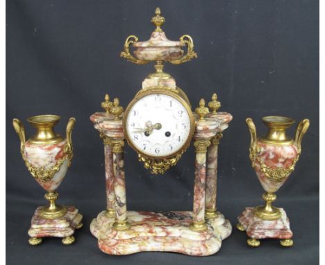 19TH CENTURY ORMOLU AND MARBLE CLOCK GARNITURE, the clock in the form of a portico, surmounted by a baluster urn, enamelled A