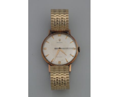MID CENTURY CLASSIC GOLD ROLEX GENTLEMAN'S WRISTWATCH, having satin face with Arabic and baton numerals, marked: Rolex Precis