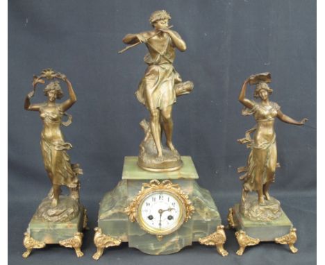 LATE VICTORIAN ART NOUVEAU DESIGN, GILT METAL AND GREEN ONYX, FIGURAL CLOCK GARNITURE, the clock with Arabic ceramic face, tw