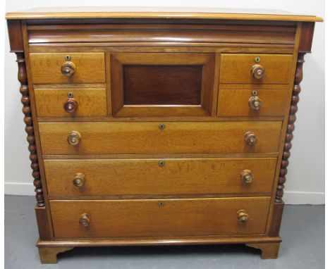 VICTORIAN OAK AND MIXED WOODS STRAIGHT FRONTED CHEST of four short and three long drawers, with turned handles and mother-of-