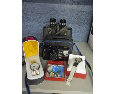 Two modern Lorus wrist watches and another fashion watch A/F, together with vintage Pal binoculars and a Nikon TW2 camera in 