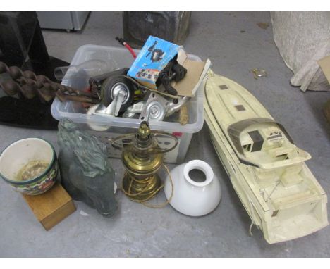 A mixed lot to include a model of a boat, an oil lamp, a bust of a horse and other items