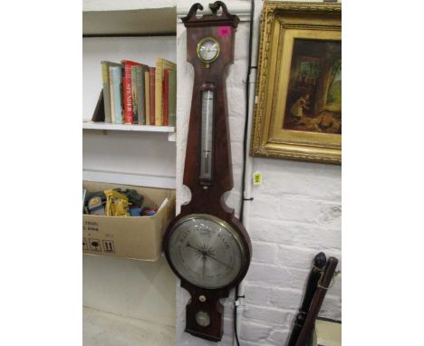 A George III mahogany cased wheel barometer with dry/damp, thermometer, silvered dial and level inscribed, Balzari and Cassin