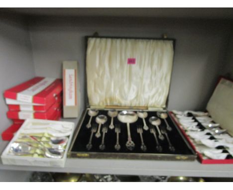 A selection of cased silver plated cutlery sets to include a dessert serving set and Sandringham plated flatware