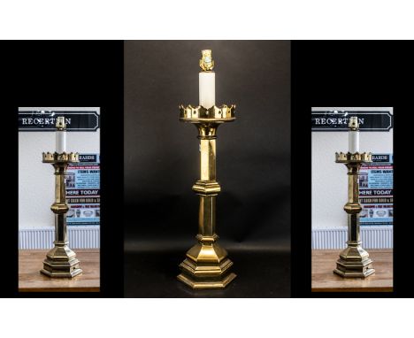 A Gothic Antique Brass Converted Candlestick Lamp of typical form, Measures 30 inches hight.