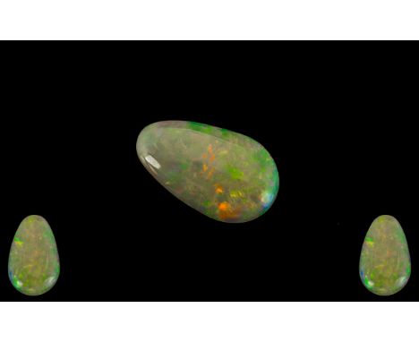 Ethiopian Natural Pear Shaped Green / Orange Opal. 3.07 cts. Measurements 20.1 x 12.2 x 3.3 mm.