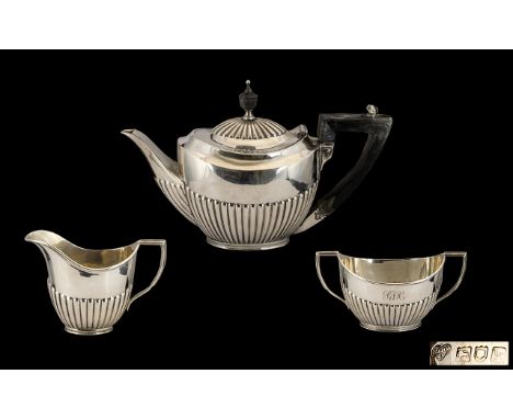 Edwardian Period Silver Three-Piece Bachelor Tea Service of small proportions.  Hallmark London 1905, Goldsmith &amp; Silvers