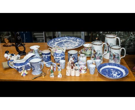 A Collection of Assorted Pottery to include a large blue and white charger, two Royal Doulton cup and saucers, duck figures, 