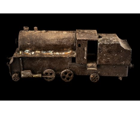 Scratch Built Tin Train with tender, c1930s, probably a paraffin fuelled working model (A/F); 15 inches (37.5cms) long x 6 in