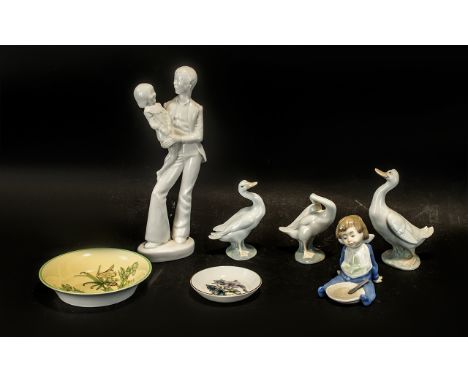 Collection of Lladro &amp; Nao Porcelain, comprising: Nao figure of a seated toddler with a plate and spoon, 4.5'' tall; two 