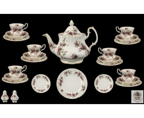 A Royal Albert Teaset 'Lavender Rose' comprising of a  teapot, 6 cups, saucers and side plates, one sandwich/cake plate and a