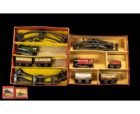 Two Boxed Hornby Railway Sets.  Hornby Set No. 21 tin plate with engine and carriages and rails, and a Hornby Train Set in ti