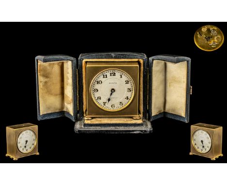 Zenith Watch Company Excellent Quality Gilt Metal Square Shaped Small Travel Clock in fitted leather case, circa 1930s.  Feat