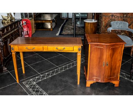 A Yew Wood Side Table of rectangular for with dummy frieze drawers on square tapering legs. Height 27 inches 42 by 15 inches 