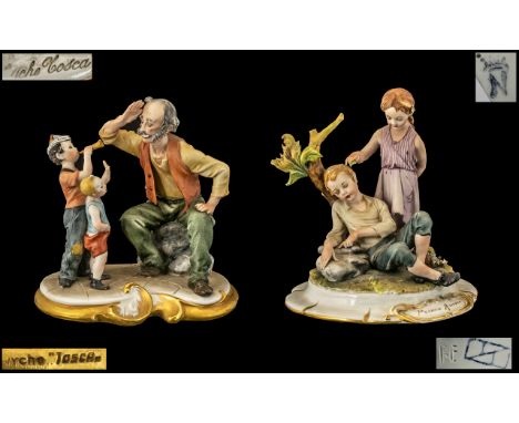 Capo-di-Monte Fine Pair of Handpainted and Signed Porcelain figure Groups.  1.  Grandfather playing with children, signed Tyc