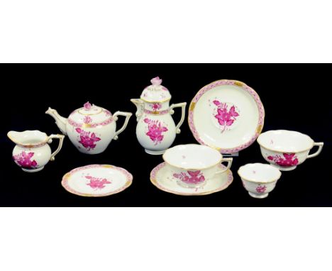 A HEREND TEA SERVICE DECORATED EN PUCE CAMAIEU WITH FLOWERS, THE SERVICE INCLUDING A BULLET TEAPOT WITH WISHBONE HANDLE