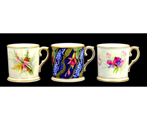 THREE ROYAL WORCESTER MUGS, TWO PAINTED WITH FLOWERS, THE THIRD WITH FUCHSIA ON A BLUE GROUND, 7CM H, PUCE OR GREEN PRINTED M