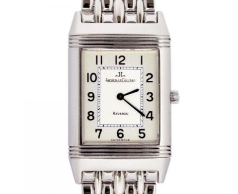 A JAEGER LECOULTRE STAINLESS STEEL REVERSO WRISTWATCH WITH SILVER DIAL AND BLUED STEEL SWORD HANDS, QUARTZ MOVEMENT, NUMBERED